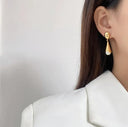 Boucles d'oreilles longues en perles