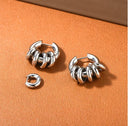Pendientes asimétricos