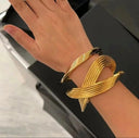 Pulsera abierta irregular oro